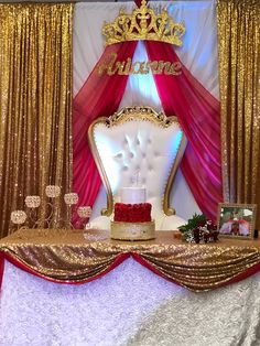 a table topped with a white and red cake