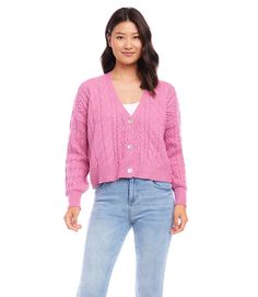 Richly textured yarns create a polished cable knit pattern over this cardigan sweater that is sure to become a wardrobe essential. Cable Stitch, Cable Knit Cardigan