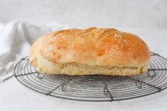 a loaf of bread sitting on top of a wire rack