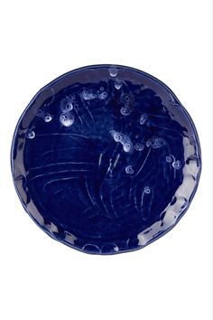 a blue plate with water drops on it