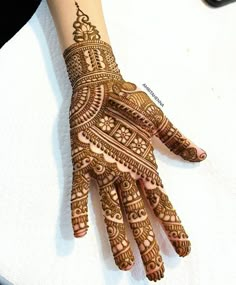 a henna on someone's hand is shown