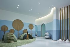 the children's playroom is decorated in pastel blue and green