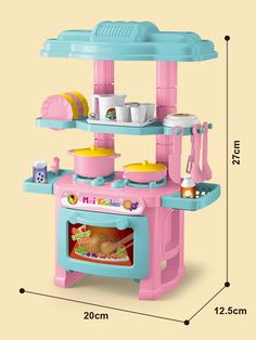 the toy kitchen is pink and blue