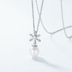 Style: Women Material: S925 Sterling Silver, Freshwater Pearl Pearl Type: Cultured Pearl Color: White Pearl Shape: Round Pearl Size: 8mm Pendant Length: 19mm