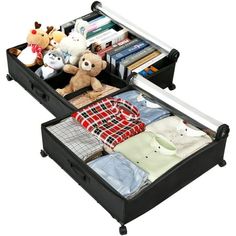 an open suitcase filled with clothes and stuffed animals on top of it's sides