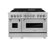 a stainless steel stove with two ovens and one burner on the top, in front of a white background