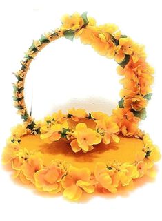 a yellow hat with flowers on it