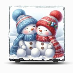 two snowmen are hugging each other in the snow