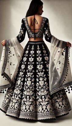 Embrace the beauty of this evergreen combo where each of your step will be filled with magic and joy!!!Make your occasions or parties more special with these elegant colours🖤🤍 #lehenga #traditionalwear #Indianoutfit #Indianattire #Indianfashion #bridalwear #lehengacollection #trendylehenga #festivalfashion #festivewear #traditionallehenga #traditionalwear #lehengadesign #black lehenga #whitelehenga #ethnicwear #Indianwear #elegantlehenga #ethniclehenga #bridallehenga #weddingwear Black And White Lengha, Black And White Lehenga, Elegant Lehenga, Elegant Colours, White Lehenga, Black Lehenga, Engagement Dress, Lehenga Collection, Engagement Dresses