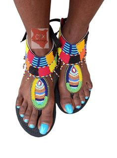 Beautifully designed African gladiators, beaded sandals, Masai sandals, summer sandals, African sandals Made from fine leather and very fine beads. Available in all sizes. Wholesale is available upon request at a discount price. Shipping is via DHL EXPRESS with a GUARANTEED delivery between 3-5 days worldwide. **BUY MULTIPLE ITEMS, PAY SHIPPING ONCE** FREE SHIPPING FOR ALL ADDITIONAL ITEMS IN YOUR CART Check out more sandals from the store. variety to chose from https://www.etsy.com/shop/CaribuK Summer Beaded Ankle Strap Sandals, Beaded Ankle Strap Sandals For Summer, Summer Festival Embellished Sandals, Multicolor Beaded Barefoot Sandals For Vacation, Traditional Multicolor Ankle Strap Sandals, Summer Beaded T-strap Sandals With Open Toe, Beaded T-strap Sandals With Open Toe For Summer, Summer Beaded T-strap Open Toe Sandals, Summer Adjustable Beaded T-strap Sandals