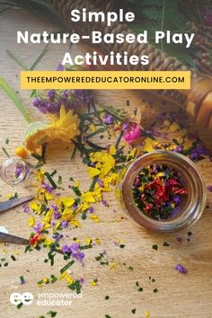 a jar filled with flowers next to a knife and flower petals on top of a wooden table