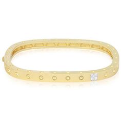 Collection : Pois MoiPrimary Material : 18k Yellow GoldPrimary Gemstone : DiamondSub Category : Bangle This fashion bracelet is part of the Pois Moi collection by Roberto Coin. Crafted from luxurious 18K yellow gold, it features a unique design that adds a touch of elegance and sophistication to any outfit. The bracelet is versatile and perfect for both everyday wear and special occasions, making it a must-have accessory for any jewelry lover. Designer Yellow Gold Bracelets With Single Cut Diamonds, Designer Yellow Gold Diamond Bracelet With Single Cut Diamonds, Designer Gold Bracelets With Single Cut Diamonds, Designer 14k Gold Bracelet With Jubilee Style, Designer 14k Gold Jubilee Bracelet, Designer Yellow Gold Diamond Bracelet, Designer Diamond Bangle Bracelet, Designer Diamond Jubilee Bracelet, Designer Diamond Gold Bracelet In Yellow Gold