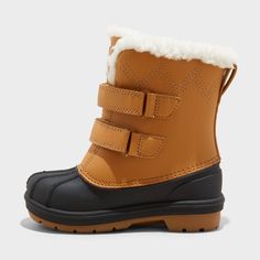 These Denver Winter Boots from Cat & Jack™ will keep your little one's toes warm during winter adventures. These winter boots feature a leather-blend solid upper along with a comfy insole and cozy faux-shearling lining, and the waterproof construction makes sure their feet stay cozy, toasty and dry. The two straps with hook-and-loop fastening complete the design with a secure fit and easy on and off. Cat & Jack™: Designed for all children so you can trust it's made for yours. Denver Winter, Toddler Winter Boots, Toddler Winter, Rubber Boot, Girls Shoes Kids, Winter Adventure, Stay Cozy, Cat & Jack, Rubber Heels