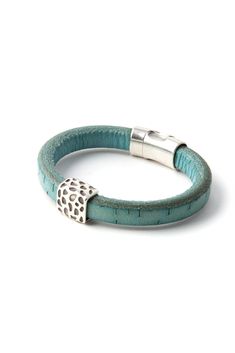 This contemporary Station Bracelet combines Turquoise cork with a “Leopard” design sliding pewter accent piece and a sturdy magnetic pewter clasp. It’s a very cool look for men and women. Stack several for more impact or wear just one. You can also wear them stacked with sterling silver cuffs. These bracelets will soon become your favorites. Handmade in Western North Carolina. Station Bracelet, Leopard Design, Silver Eagle, Silver Eagles, Sterling Silver Cuff, Silver Cuff, Accent Pieces, Jewelry Care, Rope Bracelet