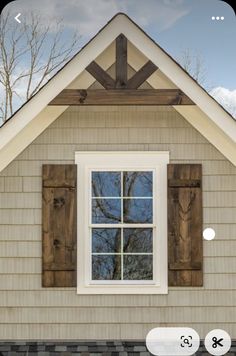 an image of a window on the side of a house