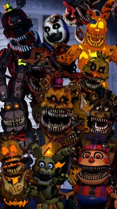 a bunch of creepy looking stuffed animals standing in front of each other with glowing eyes