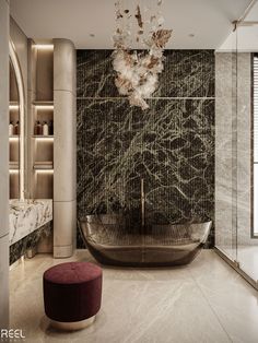 a bath room with a tub and a chandelier