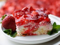 a piece of strawberry cheesecake on a plate