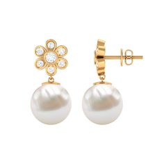 Product Details The drop earring pair combines the shimmer of Diamond and the timeless elegance of pearl to create this effortlessly classic piece. Featuring a bead set round pearl and bezel set round Diamond, that form a delicate floral motif above the white gemstone, the screw back earrings have an unmatched beauty that is sure to turn heads. Wear them as an everyday companion or to add a bit of shine to your looks. Product Information SKU SHP-EARRINGS0621114605 Length 21 mm Width 10 mm Height Freshwater Pearl Drop Earrings, Bead Set, Freshwater Pearls Earrings, Bezel Set Diamond, Diamond Flower, Drop Earring, Screw Back Earrings, Pearl Drop Earrings, Pearl Drop