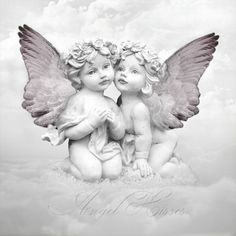 two cherubs with pink wings sitting in the clouds