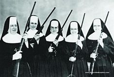 an old black and white photo of women dressed in nun suits with long hair, holding crucifixs