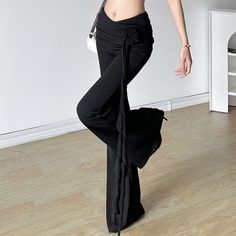 Introducing our Black Gothic Ruched High Waist Flare Pants, designed for those who embrace an edgy and alternative aesthetic. These pants feature a unique floral embellishment on the side for added sophistication. The ruched detailing and flared silhouette create a flattering fit, while the high waist ensures comfort and style. Make a bold and fashionable statement with these standout black pants. Unique floral embellishment on the side Ruched detailing for a flattering silhouette Flare design f Spring Ruched Wide Leg Pants, Spring Wide Leg Ruched Pants, High Waist Bottoms With Ruched Sides For Night Out, High-waist Ruched Bottoms For Night Out, Ruched Party Pants, Spring Ruched Wide Leg Bottoms, Trendy Party Bottoms With Ruched Sides, Trendy Ruched Party Bottoms, Spring Party Bottoms With Ruched Sides