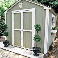 a shed with the words before and after written on it