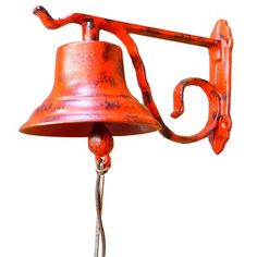 an orange metal bell on a white background