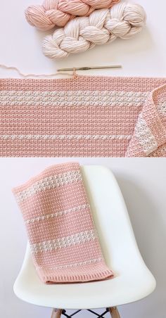 two skeins of yarn sitting on top of a white chair next to a pink blanket