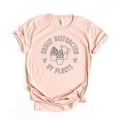 Looking for a cute versatile top to wear this summer? Make sure to grab one of our Caffeine And Kindness tees! This soft and comfortable graphic tee is the perfect top for any outfit. It can be paired with biker shorts, jeans, or even a simple skirt/dress! This tee is true-to-size, so be sure to order your regular t-shirt size! If you are looking for a more oversized look, make sure to size up! Pink T-shirt With Funny Print For Everyday Wear, Pink Casual Tops With Comfortable Fit, Casual Pink Tops With Comfortable Fit, Pink Graphic Tee For Everyday, Everyday Pink Graphic Tee, Everyday Pink T-shirt With Funny Print, Pink T-shirt With Funny Print For Everyday, Flower House, Simple Skirt