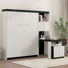 a room with a desk, chair and bookcase in white and black color scheme