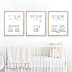 three framed prints on the wall above a crib in a baby's room