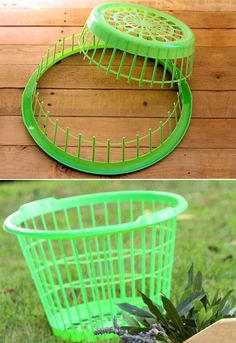 a green plastic basket sitting on top of a wooden floor next to a planter