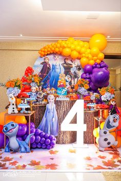 a birthday party with balloons and decorations