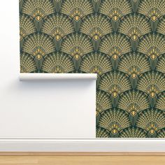 an art deco wallpaper design with green and gold fan pattern on the back side