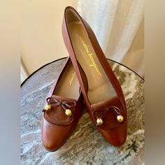 Perfect Condition, No Scuffs Light Wear Inside Environment. Warm Toffee Brown Buttery Leather. Very Comfortable, Matches Almost Everything! Take These Gold Bows With You To Valentines Dinner! Elegant Formal Moccasins With Tassels, Elegant Flat Leather Shoes For Fall, Elegant Leather Shoes With Tassels And Round Toe, Elegant Calf Leather Slip-on Tassel Loafers, Elegant Brown Loafers With Tassels, Elegant Calf Leather Tassel Loafers Slip-on, Elegant Slip-on Moccasins With Tassels, Elegant Calf Leather Moccasins For Fall, Business Tassel Loafers With Closed Toe