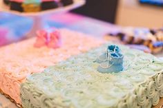 there is a cake that looks like it has a baby boot on top of it