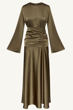 Indulge in luxury and sophistication with our Shams Satin Side Rouched Maxi Dress in Olive. The elegant hue is enhanced by the side rouched detailing, creating a flattering silhouette. The dramatic flare sleeves add a touch of drama and femininity to this must-have piece. Model is 5'7" and is wearing size XS/58". Modest Silk Dress, Olive Silk Dress, Olive Green Fashion, Satin Dress Outfit, Elegant Silk Dresses, Maxi Dress Long Sleeve, Modest Evening Dress, White Dress Formal, Nikkah Dress