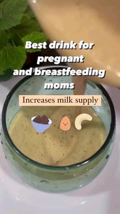 a glass bowl filled with liquid next to a green plant and a sign that says best drink for pregnant and breastfeeding moms