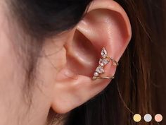 Available in 3 colours ✦ 18k gold plated ✦ Rhodium plated ✦ 18k rose gold plated Quality & Detail ✦ Ear cuff : Your ears don't have to be pierced to wear this product. ✦ Fits any ear as it is adjustable. ✦ The height 16.2mm ✦ The width 10.3mm ✦ Cubic zirconia size 5mm ✦ Pearl size 2mm ✦ Sold individually : Comes in a cute little package ready for gifting Shipping from United Kingdom Rose Gold Plated Cartilage Earrings, Elegant Gold Plated Silver Ear Cuff, Gold Delicate Pierced Ear Cuff, Elegant Gold Plated Cartilage Earrings For Wedding, Elegant Tarnish Resistant Ear Cuff As A Gift, Delicate Gold Pierced Ear Cuff, Elegant Rose Gold Hypoallergenic Cartilage Earrings, Elegant Gold Plated Ear Cuff Gift, Elegant Hypoallergenic Rose Gold Ear Climbers