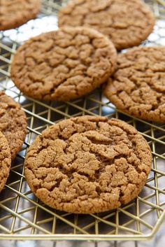 several cookies are cooling on a wire rack