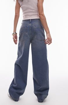 A wide-leg fit and light wash exaggerate the retro attitude of nonstretch-denim jeans that play a key role in your off-duty wardrobe. 27 1/2" inseam; 9 1/2" leg opening; 14" front rise; 16" back rise (size 32) Zip fly with button closure Five-pocket style 100% cotton Machine wash, line dry Imported Baggy Mid-rise Denim Flare Jeans, Baggy Mid-rise Washed Blue Bottoms, Baggy Mid-rise Jeans With Button Closure, Baggy Denim Blue Mid-rise Wide Leg Pants, High-rise Baggy Flare Jeans In Rigid Denim, Baggy Jeans, Off Duty, Denim Jeans, Wide Leg