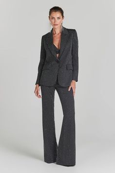 DESCRIPTION & FEATURES The KIRA Black Pants are the perfect piece for those daring to make a statement. Made from our exclusive crepe with crystal embellishment this statement pant will carry you through the night. Why not pair with our matching KIRA Black Bra Top and KIRA Black Blazer to complete the look?- Made from our exclusive crepe with crystal embellishment- Figure skimming cut with a wide leg hem-Pair with the matching Blazer and Bra Top SIZE & FIT INFORMATION - Item runs to our size cha Chic Black Wide-leg Suit, Chic Black Wide Leg Suit, Luxury High-waisted Evening Pantsuit, Luxury High-waisted Pantsuit For Evening, Luxury Pantsuit For Night Out, Luxury Fitted Bottoms For Party, Black Notch Lapel Pantsuit For Party, Luxury Evening Pantsuit, Glamorous Black Pants For Workwear