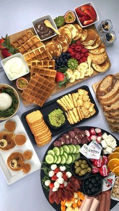 a table topped with lots of different types of food