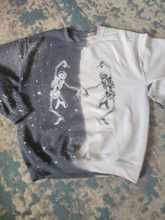 Half bleached dancing skeleton crewneck Sweatshirt is Unisex Gildan 50/50 polyester/ cotton Super soft and comfortable  Style may vary slightly due to the process. Will try my hardest to make it exact.  The sweater may either be bleached on the right or the left side! Depending what prints I have in stock. Turn around time 7-14 days. Bleached Sweatshirt, Skeleton Sweatshirt, Halloween Tee Shirts, Cute Skeleton, Dancing Skeletons, Dancing Skeleton, Casual Tie, Crewneck Design, Skeleton Shirt