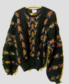 June Wilson 100% wool, made in England, crew neck, black trim with multi color designs, size small, never worn, original Hudson tags on sweater.  Bulky sweater, shoulder to shoulder 27inches, sleeves 27 inches, length 26 inches, across the chest 25 inches. Wool is a rough wool. Vintage Black Sweater For Fall, Black Wool Sweater With Fair Isle Pattern, Black Vintage Sweater With Fair Isle Pattern, Retro Black Sweater With Fair Isle Pattern, Bulky Sweater, Bulky Sweaters, Mens Sweaters, Sweater Vest Mens, Pullover Outfit