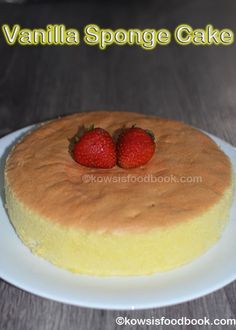 vanilla sponge cake with two strawberries on top and the words vanilla sponge cake above it