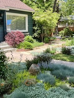 a house with landscaping in the front yard