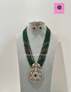 Emerald Victorian Polki Kundan Necklace/Indian Long Necklace/Statement Necklace/Long Mala/Semi Precious Necklace/Rani Haar/Pakistani jewelry Kundan Mala Pendant Set With 2 Tone Plating Length = 18 Inch Kundan Pendant Set Height = 90 mm || Width = 70 mm Earring Height = 46 mm Ships from California in 1 business day and delivery within 2-5 business days in the USA.  Color, shades, and texture displayed may vary slightly from the actual product due to digital image limitations. We request that you consider these minor variations. Please expect the possibility of some slight imperfections when buying handmade jewelry.  Please let me know if you have any questions. Arrives in a gift box. Thank you so much for visiting my shop. Traditional Jewelry Sets With 17 Jewels Pendant, Traditional Heavy Emerald Necklace For Gift, Silver Necklace With Cutdana Round Beads, Traditional Silver Necklace With Emerald Stone Work, Traditional Silver Emerald Necklace With Stone Work, Traditional Pendant Necklace With Stone Work, Traditional Round Beads Emerald Necklace For Festive Occasions, Traditional Emerald Necklace With Round Beads For Festive Occasions, Festive Polished Beads Pendant Necklace