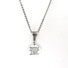 "This is a stainless steel laser engraved pendant on a stainless steel link chain with a silvertone bale. The pendant says \"God's power at work in us can do far more than we dare ask or imagine\" from Ephesians 3:20. This pendant is available on your choice of 16, 18, 20, 22, 24, 26, 28 or 30 inch stainless steel link chain. The pendant is also available for individual purchase if you have another chain on which you would like to wear it. The pendant measures approx. 3/4 inch across. Each neckl Inspirational Silver Stainless Steel Jewelry, Inspirational Nickel-free Silver Necklace, Inspirational Silver Jewelry For Father's Day, Inspirational Nickel-free Stainless Steel Jewelry, Meaningful Silver Stainless Steel Necklace, Stainless Steel Round Pendant Necklace For Father's Day, Inspirational Silver Charm Necklace With Round Pendant, Inspirational Silver Stainless Steel Necklace, Inspirational Silver Stainless Steel Necklaces